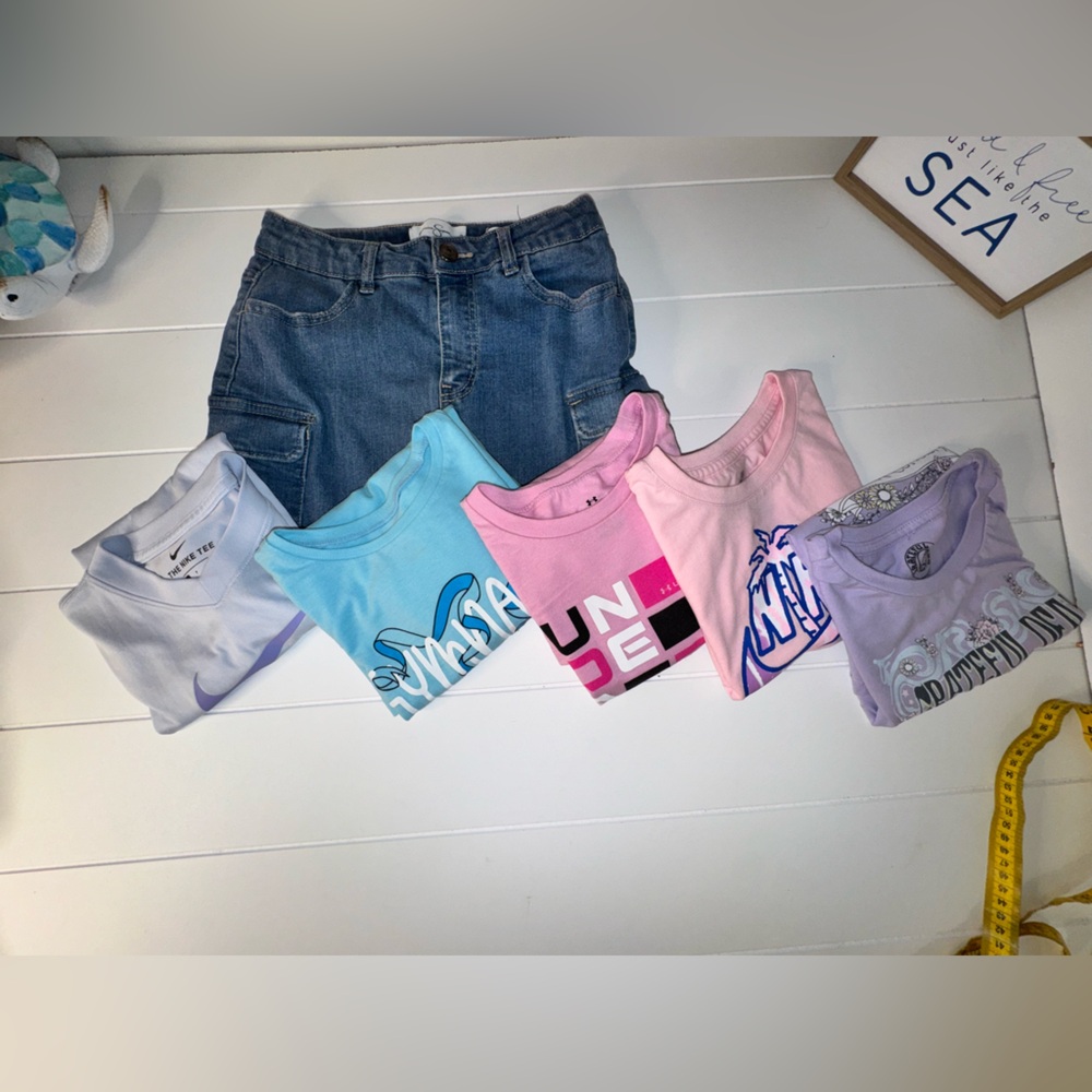 6 pieces - Nike, Under Armour, Jessica Simpson 5 Shirts and 1 Skirt SEE MEASURES